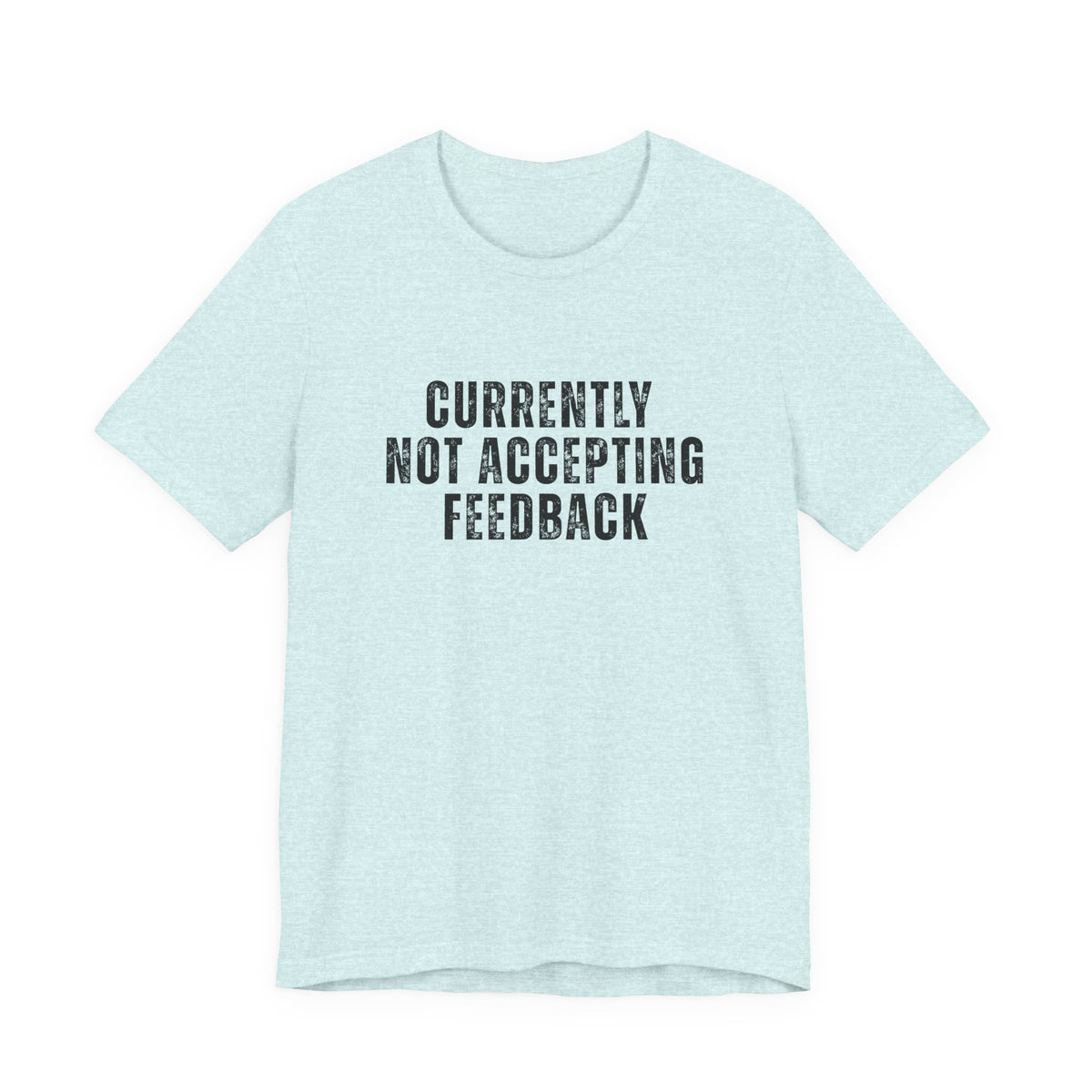 A light blue heather crewneck t-shirt with the text 'CURRENTLY NOT ACCEPTING FEEDBACK' printed in black across the chest, displayed on a solid white background.