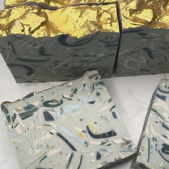 Amber Plumeria artisan cold-process soap bar and packaging